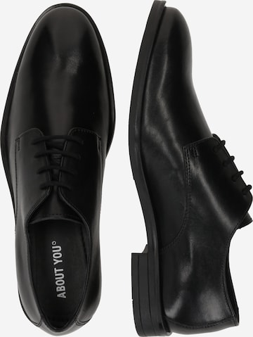 ABOUT YOU - Zapatos con cordón 'Carlo' en negro
