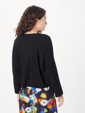 Pull-over Sisley en noir