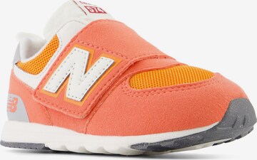 new balance Sneaker '574' in Orange