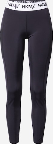 Skinny Pantaloni sport de la HKMX pe negru: față