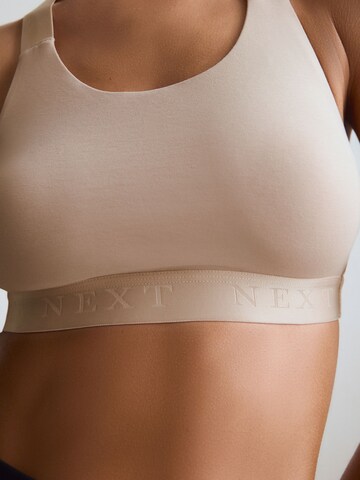 Bustino Reggiseno sportivo di Next in beige