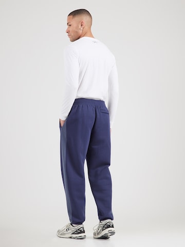 Loosefit Pantalon de sport UNDER ARMOUR en bleu