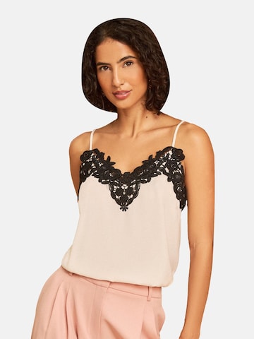 Top de la love & roses pe bej: față