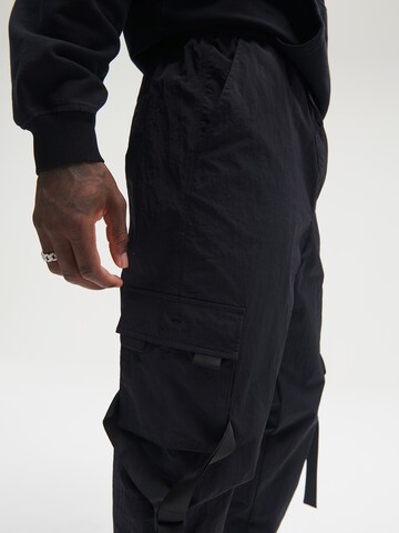 Sinned x ABOUT YOU Tapered Cargo Pants 'Jack' in Black