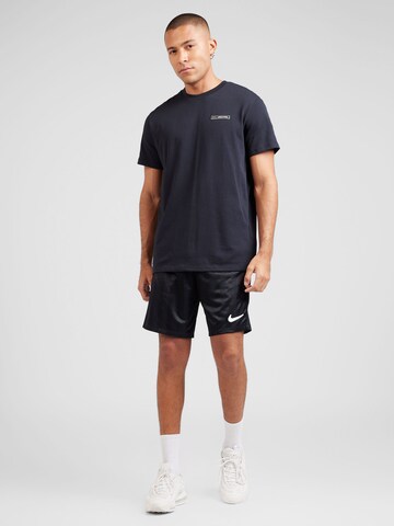 Maglia funzionale di UNDER ARMOUR in nero
