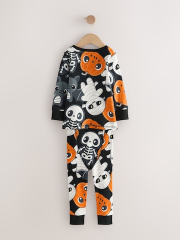 Pijamale de la Next pe negru