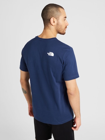 THE NORTH FACE T-shirt 'WOODCUT DOME' i blå