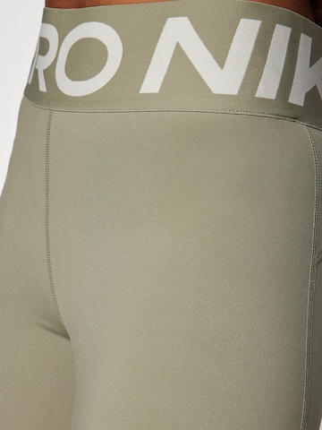 NIKE Skinny Sportnadrágok - zöld
