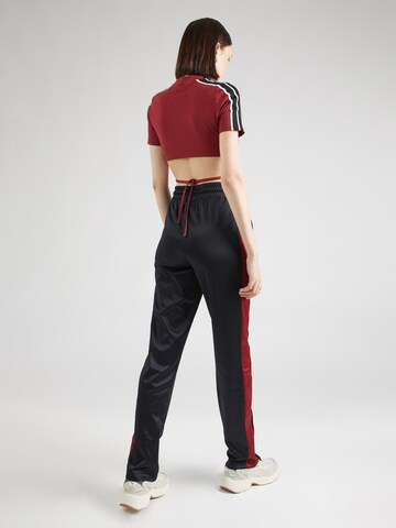 ELLESSE Regular Trousers in Black