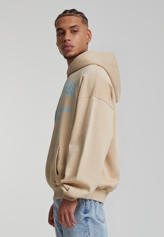 Felpa di Karl Kani in beige