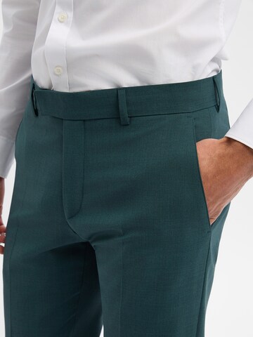 Coupe slim Pantalon à plis 'Melvin' STRELLSON en vert