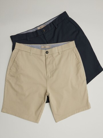 regular Pantaloni chino di Next in blu
