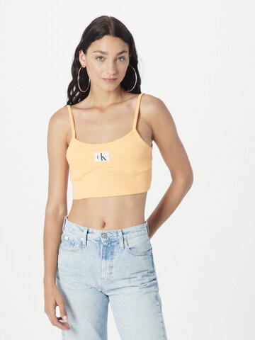 Calvin Klein Jeans - Top en naranja: frente