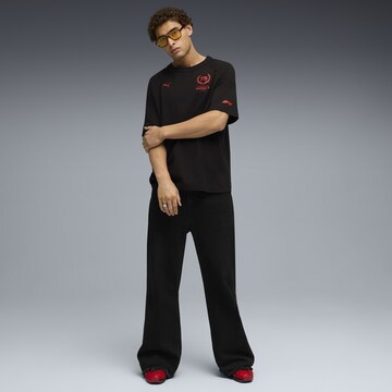 PUMA Functioneel shirt 'F1 75yrs' in Zwart