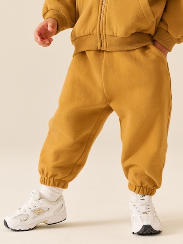 Next Tapered Housut värissä keltainen: etupuoli
