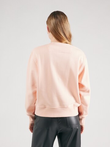 GUESSSweater majica - narančasta boja