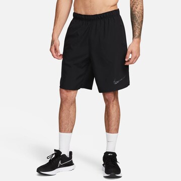 NIKE Regular Workout Pants in Black: front