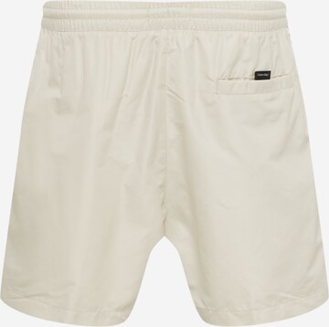 Shorts de bain Calvin Klein Swimwear en beige