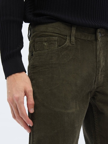 KİP Slimfit Kalhoty – zelená