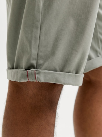 Regular Pantalon chino 'JPSTBowie' Jack & Jones Plus en vert