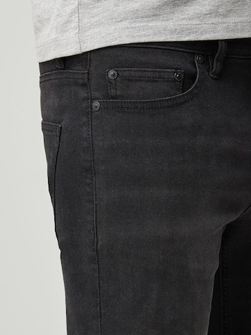 Next Skinny Jeans 'Motion Flex' in Black