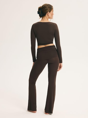 Flared Pantaloni di ESOTIQ in marrone