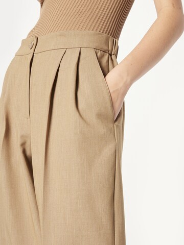 Wide leg Pantaloni con pieghe di rosemunde in marrone