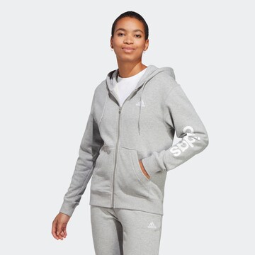 Bluză cu fermoar sport 'Essentials Linear French Terry' de la ADIDAS SPORTSWEAR pe gri: față