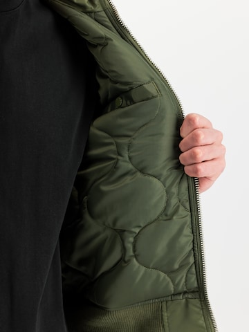 ALPHA INDUSTRIES Between-Season Jacket 'Engine' in Green: front