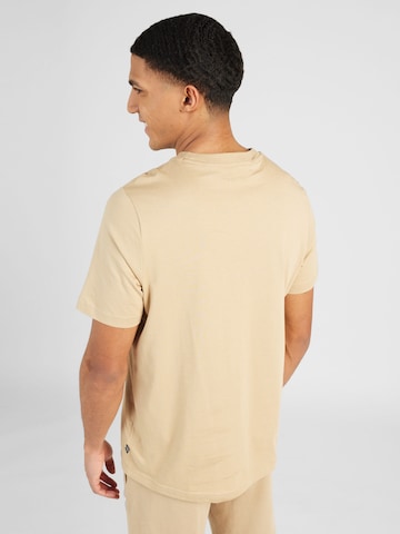 PUMA Functioneel shirt 'ESS+' in Bruin