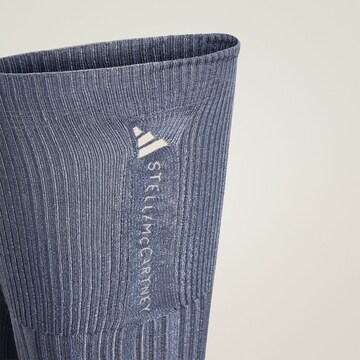 ADIDAS BY STELLA MCCARTNEY Beenwarmers 'adidas by Stella McCartney' in Zwart