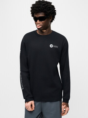 new balance T-shirt i svart