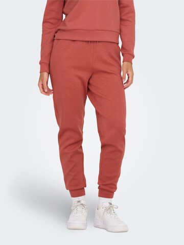 ONLY PLAY Tapered Workout Pants in Red: front