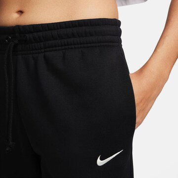 Nike Sportswear Zúžený Sportovní kalhoty 'Phoenix Fleece' – černá