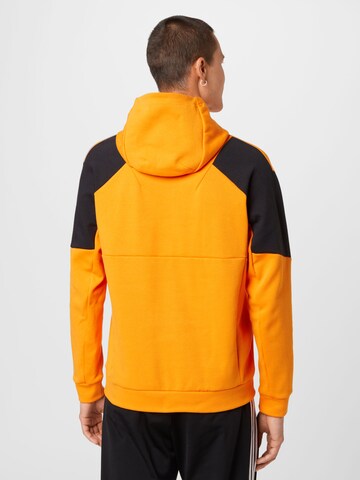 ADIDAS SPORTSWEAR - Sweatshirt de desporto em laranja