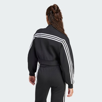 ADIDAS SPORTSWEAR Спортна жилетка с качулка 'Future Icons' в черно