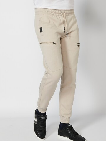 KOROSHI Tapered Trousers in Beige: front