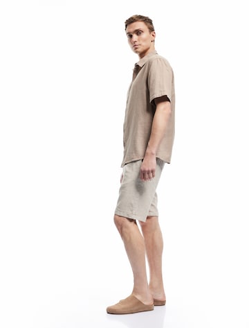 Koton Regular Pants 'Bermuda' in Beige