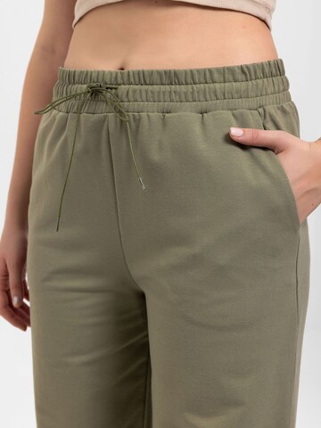 Tapered Pantaloni di Anou Anou in verde