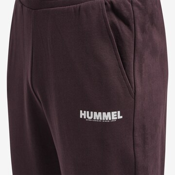 Tapered Pantaloni sportivi 'Legacy' di Hummel in marrone