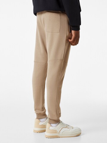 Bershka Baggy Kalhoty – béžová