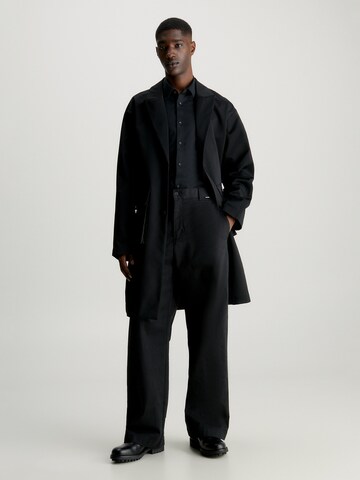 Calvin Klein Between-Seasons Coat in Black: front