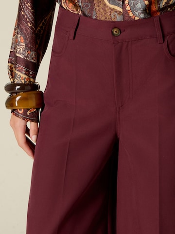 oltre Baggy Trousers in Red