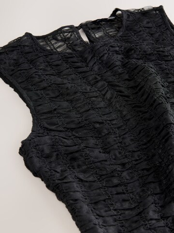 Next - Blusa en negro