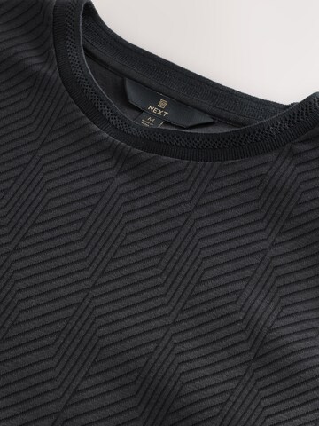 T-Shirt Next en noir