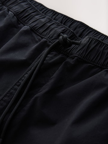 Next Tapered Cargobroek in Zwart