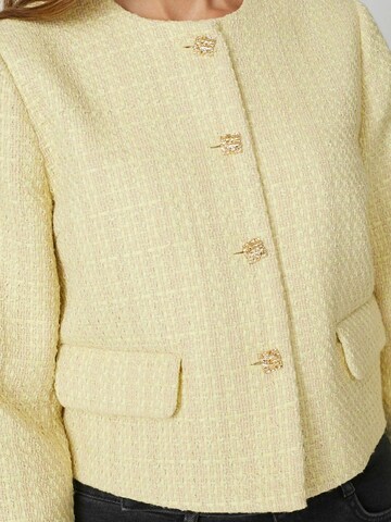 Veste mi-saison ' Yara' co'couture en jaune