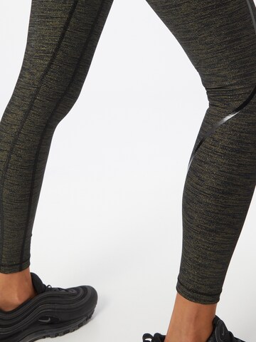 Casall Skinny Sportbyxa i guld
