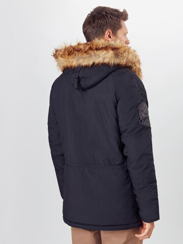 ALPHA INDUSTRIES Vinterparkas 'Explorer' i svart