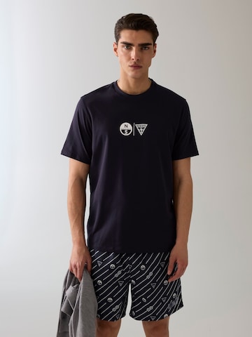 GUESS Board Shorts in Black: front